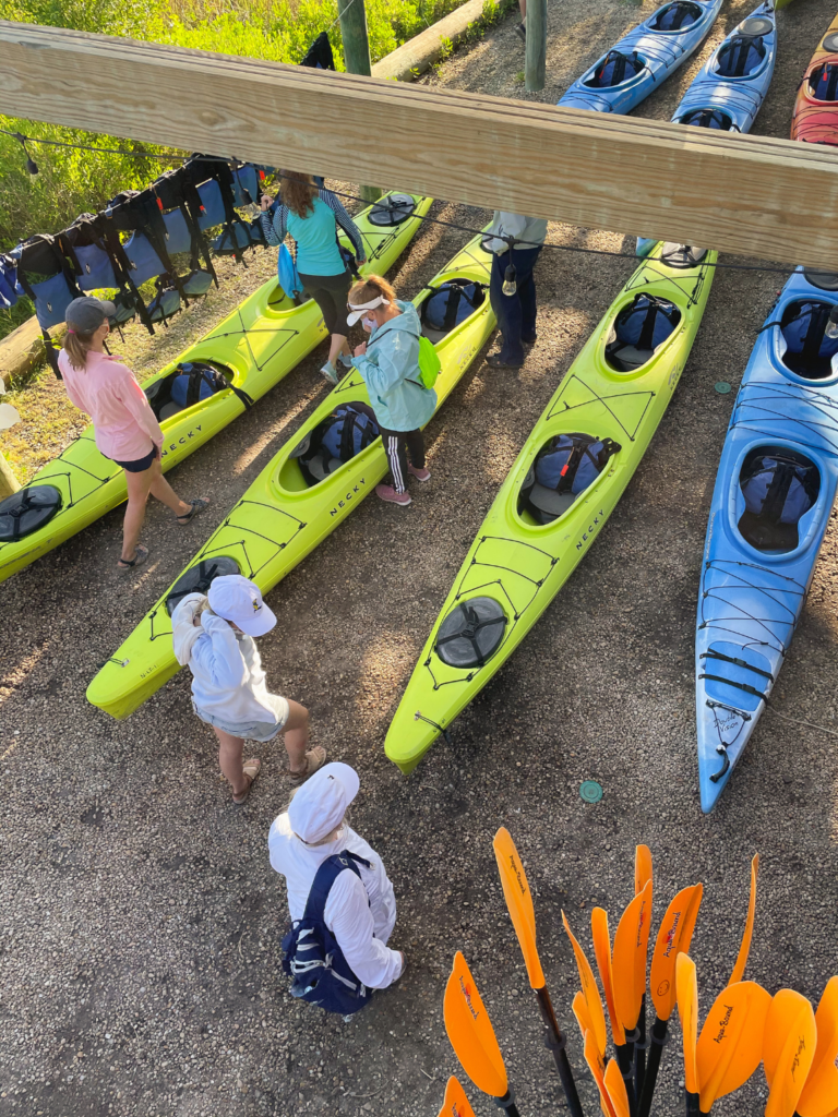 guests prepping to go kayaking