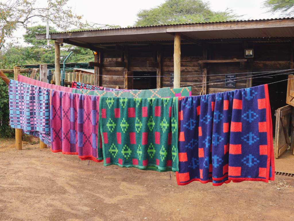 Colorful blankets hanging up to dry at Sheldrick Wildlife Trust in Nairobi Kenya