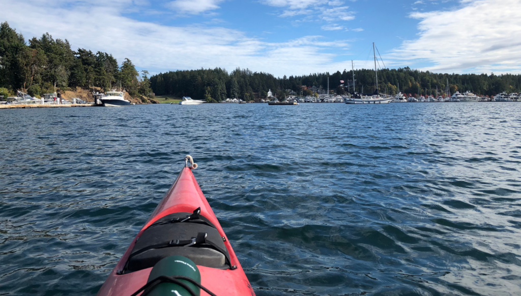 Kayaking back into Roche Harbor after our five hour excursion.